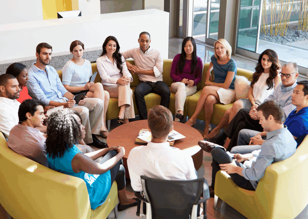 cultural holidays team sitting together in a circle 